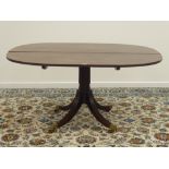 Regency mahogany dining table, figured tilt top,