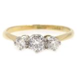 Gold three stone diamond ring,