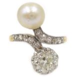 18ct gold (tested) old cut diamond and pearl cross over ring, with diamond set shoulders,