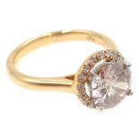 18ct rose gold diamond halo ring, stamped 750, central diamond approx 1.