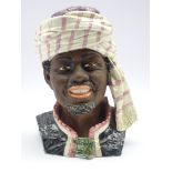 Late 19th century Austrian tobacco jar and cover in form of an African wearing a turban,