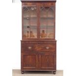 Georgian mahogany secretaire bookcase, projecting cornice above two astragal glazed doors,