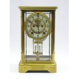 Early 20th century brass four glass mantel clock,