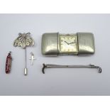 Art Nouveau style silver-plated brooch and another in the form of a riding crop,