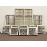 Collection of lead glazed stained glass windows with stylised floral design,