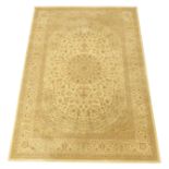 Persian Keshan design carpet, scrolled interlacing foliate field with central medallion,