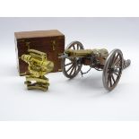 Brass Theodolite stamped Askania Werke, Berlin in brass bound teak case and a replica cannon model,