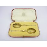 Pair of silver gilt copies of the Anointing Spoon,