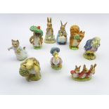 Nine Beswick Beatrix Potter figures; Tommy Brock, Benjamin Bunny, Squirrel Nutkin,