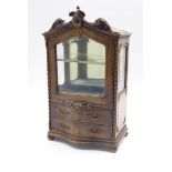 20th Century French walnut miniature vitrine with a fall front bevelled glass door above 2 velvet