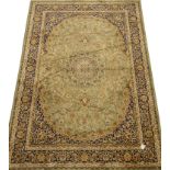Persian Kashan pattern rug/wall hanging, medallion and floral design on a beige field and bordered,