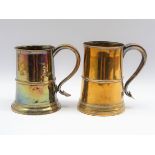 Two George III old Sheffield plate tankards with s-scroll handles and heart shaped terminals,