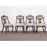Set four Edwardian walnut dining chairs, pierced and carved cresting rails and splats,