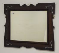 Arts & Crafts period oak framed wall mirror, pierced decoration, bevelled glass plate,