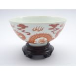 Chinese Shanghai Tang porcelain bowl decorated with a five-claw dragon chasing the flaming pearl,
