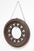 20th century Gothic Revival mirror, circular oak frame decorated with trefoil band,