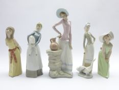 Collection of Lladro figures; Girl with Geese, Girl with lamb, two other girls,