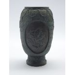 Late 19th Century Japanese bronze vase with panels of figures and prunus on an engraved ground H