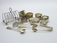 Seven silver serviette rings, silver bangle, 6 division toast rack and other items 10.