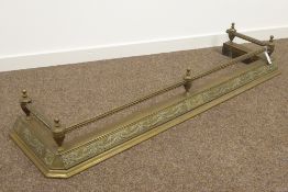 19th century brass fire fender, five urn finials holding beaded rail,