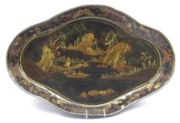 Chinoiserie decorated papier mache tray of shaped oval design decorated with a river landscape 78 x