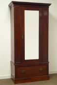 Late Victorian narrow mahogany wardrobe, centre bevelled mirror door above single drawer, W100cm,