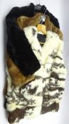 Three vintage fur jackets comprising a three quarter length Coney jacket with black leather bands,