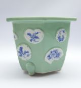 Late 19th Century Chinese hexagonal Jardiniere decorated with fan shape panels on a celadon ground