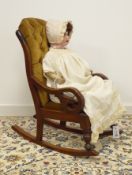 Small Victorian mahogany open arm rocking chair,