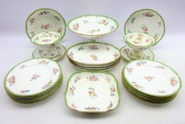 Mid 19th century Minton & Hollins dessert service decorated with sprays of flowers within green