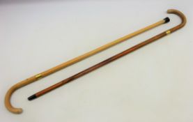 Two Edwardian Malacca walking sticks with gilt metal collars inscribed Hon W. Stourton and W.M.