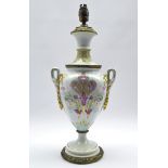 19th century Continental two-handled urn shaped porcelain oil lamp,