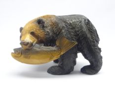 Black Forest style carved wooden bear with salmon catch,