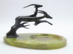 Art Deco onyx dish mounted with two patinated bronze leaping Gazelles, signed G.M.