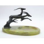 Art Deco onyx dish mounted with two patinated bronze leaping Gazelles, signed G.M.