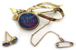 Gold oval opal bow brooch,