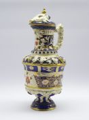 Large 19th century ewer, decorated in the Imari palette, relief moulded with trailing grape vines,
