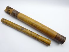Indonesian bamboo quiver with all over incised decoration and a bamboo smoking pipe,
