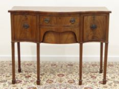 Early 19th century mahogany serpentine sideboard, three drawers and cupboard,