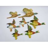 Pair Beswick graduating Pheasant wall plaques no.