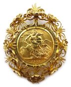1959 gold sovereign, loose mounted in gold open work flower design pendant/brooch, hallmarked 9ct,