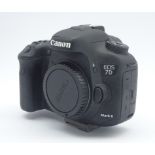 Canon EOS 7D Mark III DSLR camera body with box