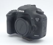 Canon EOS 7D Mark III DSLR camera body with box