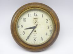 B.R.(M) station Smiths oak cased circular wall clock with eight day spring driven movement No.