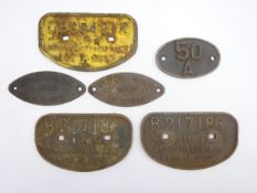 Six mid-20th century cast iron railway wagon plates including two pairs,