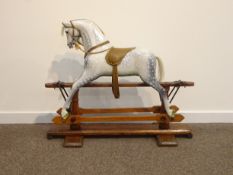 Early 20th Century dapple grey rocking horse by Ayres on a pine trestle base Height 79cm x L95cm