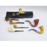 Seven meerschaum smoking pipes including boxed Stanwell Elegance,