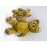 Two graduating vintage plush & jointed Teddy bears, probably Merrythought,