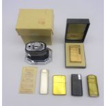 Cartier silver plated lighter with reeded rounded oblong body,