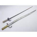 French model 1866 sabre bayonet with 58cm steel curving blade and a French model 1886 Epee bayonet